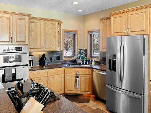 Well appointed kitchen with SS appliances and built-in oven/microwave