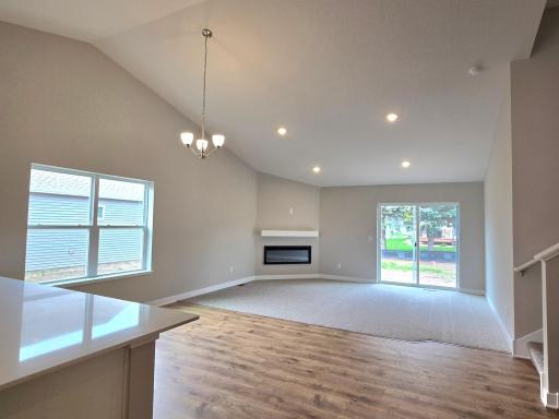 This is a photo of the actual home, which includes an electric fireplace in the corner!