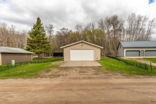 The house sits on the lakeshore lot and the extra large 2 stall garage is on the lot across the street.
