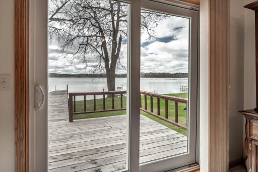 Newer patio door leads to a deck overlooking East Lost Lake.