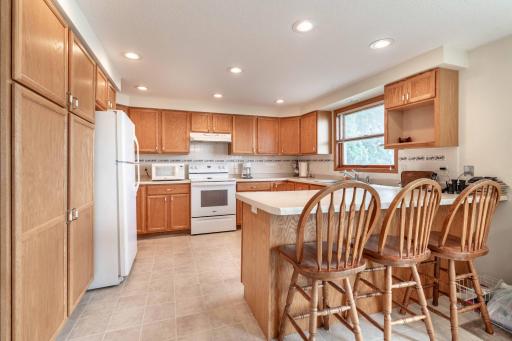 Fantastic kitchen with lots of cabinets and views of the lake while doing dishes!