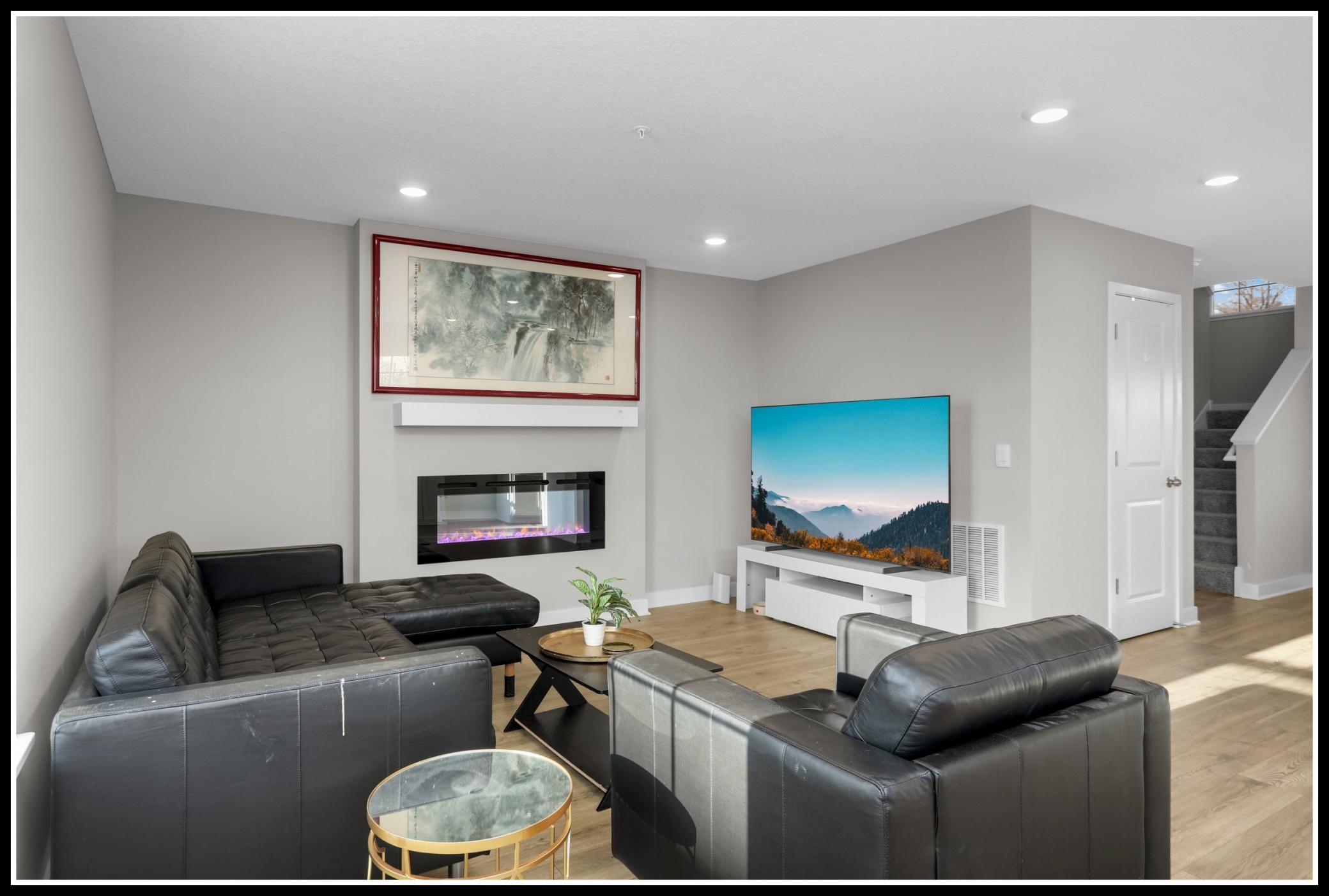 Contemporary fireplace adds ambiance and extra warmth