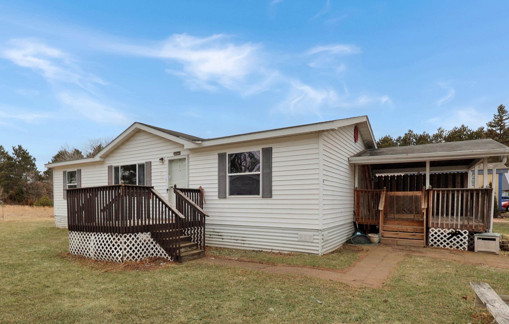 Side entrance and covered front porch.