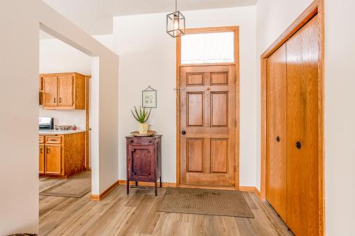 Welcoming entryway with convenient closet storage and easy access to the main living areas.