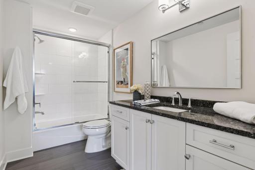 En-suite full bathroom in the second bedroom.