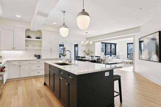 Fabulous kitchen island offering comfortable seating for four, ideal for casual meals and conversation.