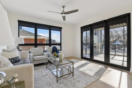 Tons of natural light floods this room, with direct access to the deck.