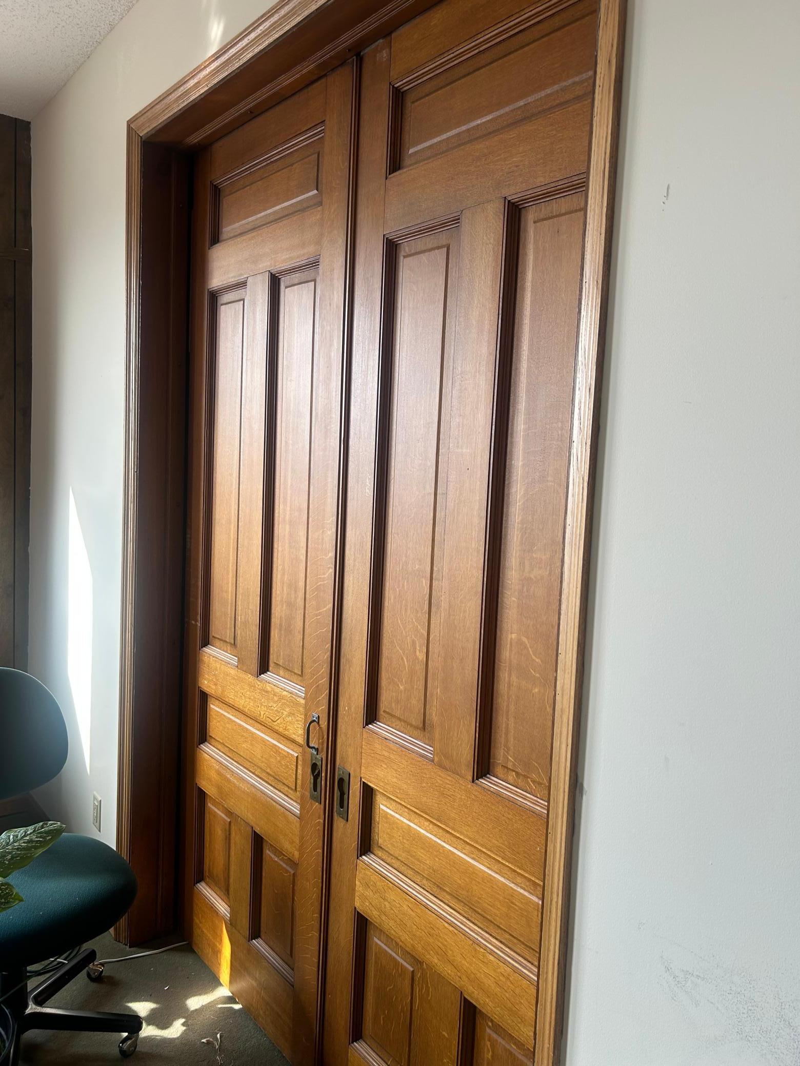 Nine foot solid pocket doors.