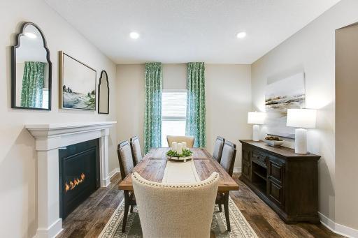 Photo is staged as a formal dining room, but this space can also be used as a quiet and cozy reading room or lounge area.