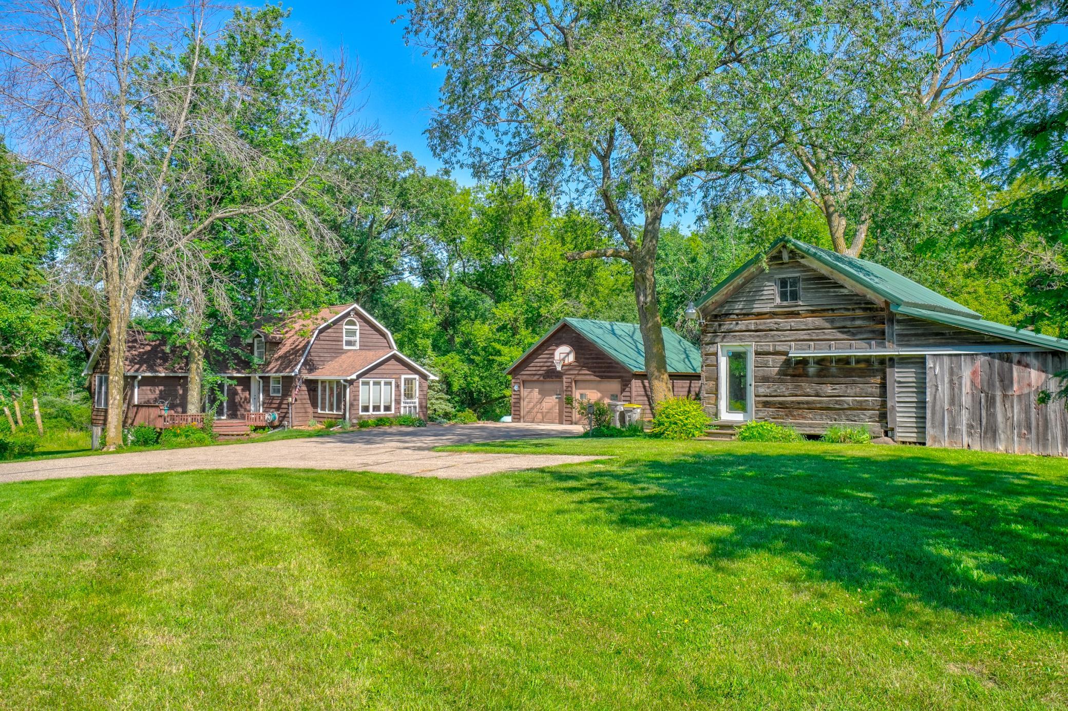 Surrounded by 3.69 beautiful private acres, this charming 3 bed, 2 bath home offers the perfect blend of rustic character, functional living, and exceptional space inside and out.