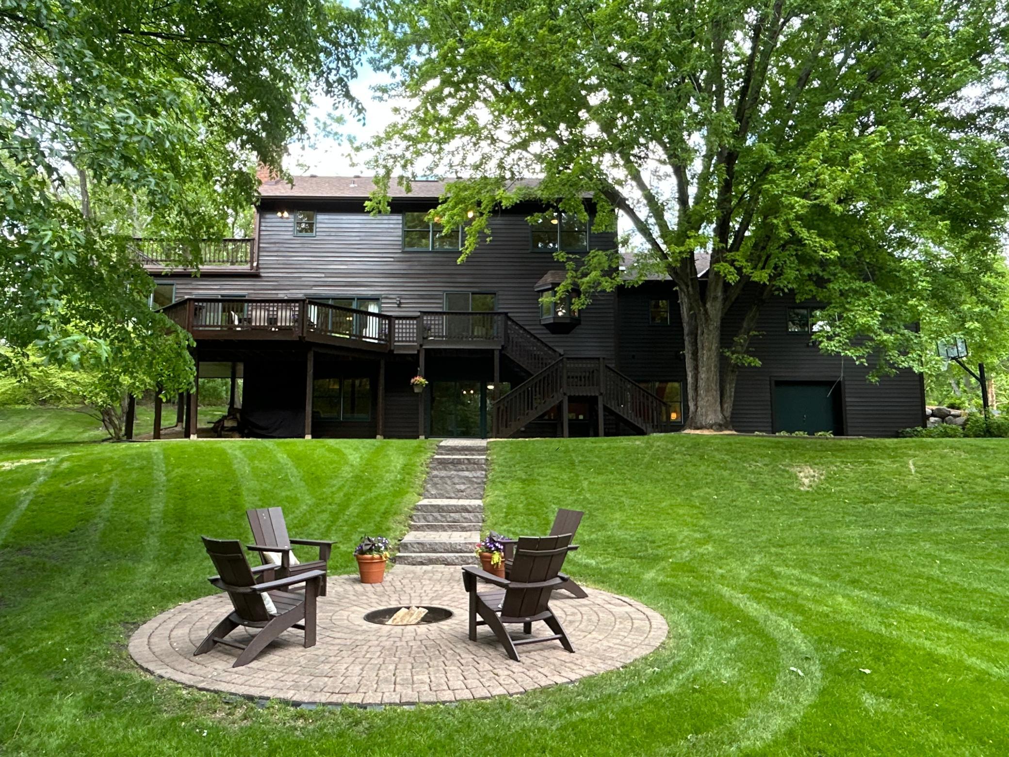 Nestled on a 1+ acre lot, this backyard is a true paradise.