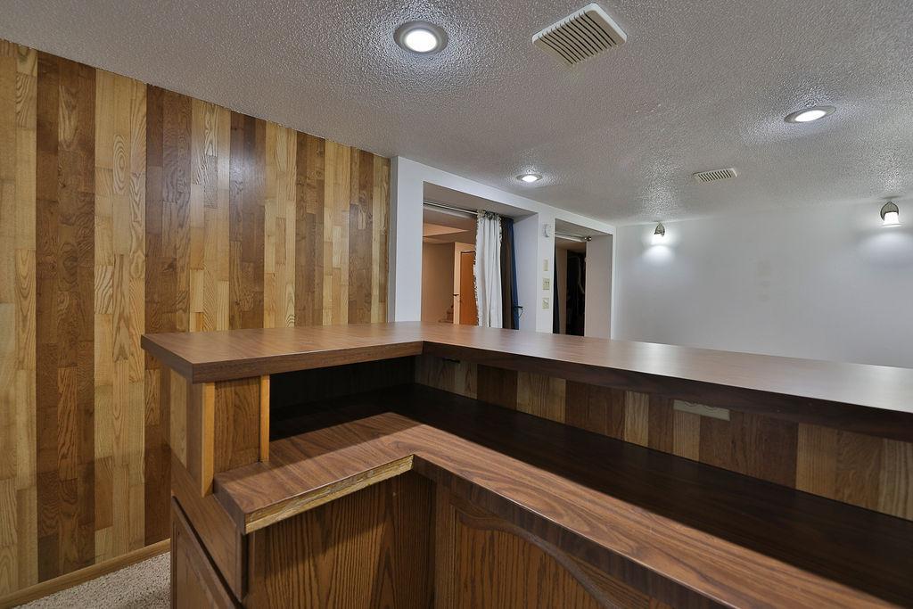 Wet bar view to flex space & family room