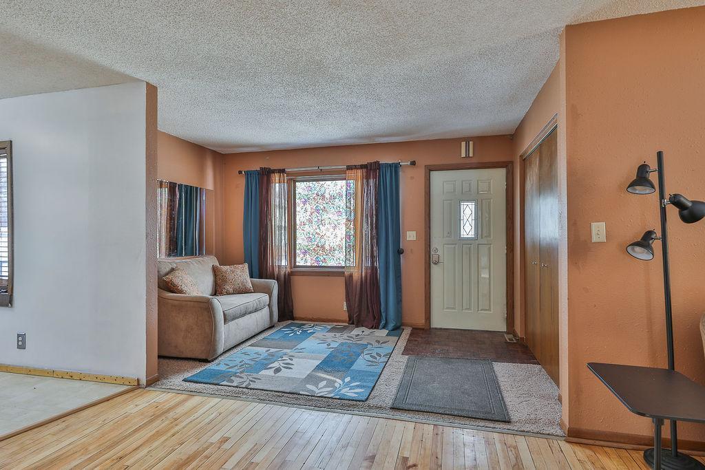 Front entry/foyer space with coat closet