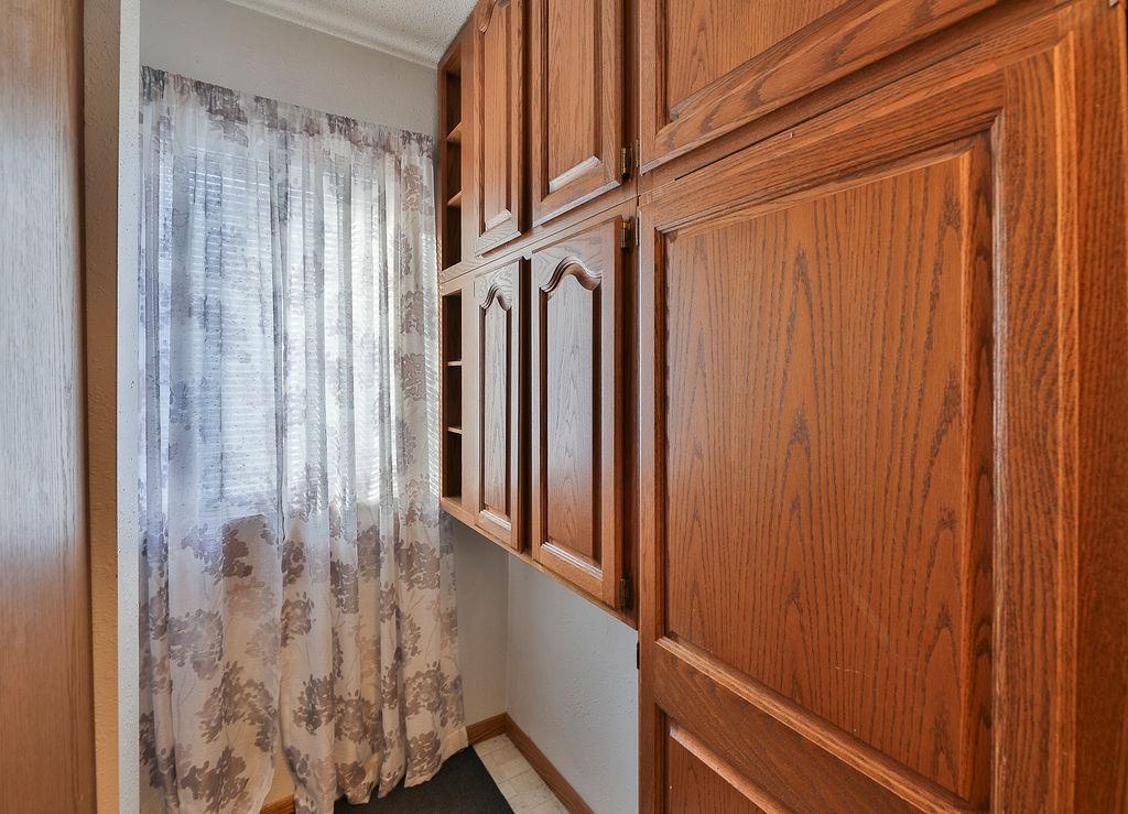 Storage/Flex Room... Pantry, Mudroom. Lots of cabinets & storage!