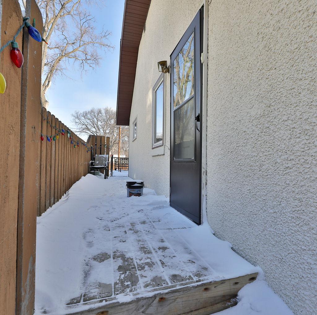 Side door to Kitchen on wraparound deck