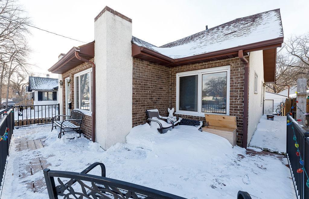 Large front deck that wraps to the side of home