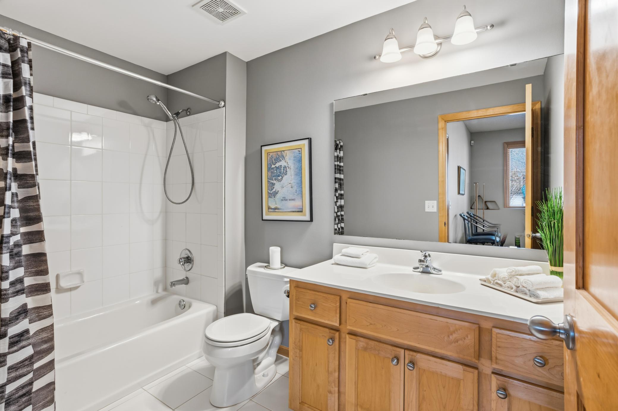 The lower level full bath is a rare find in home today.