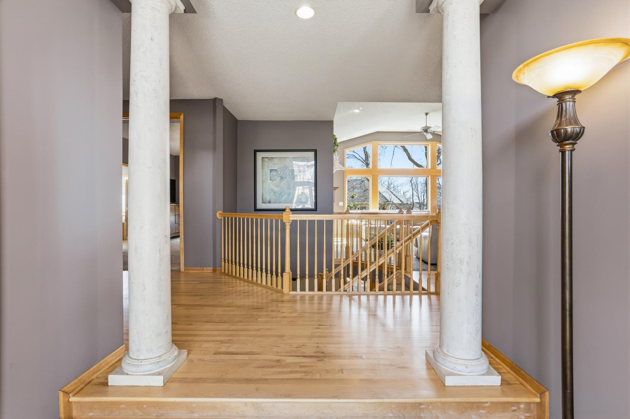 Guests will appreciate this grand foyer and view through to the stunning wall of windows beyond as they enter your home.