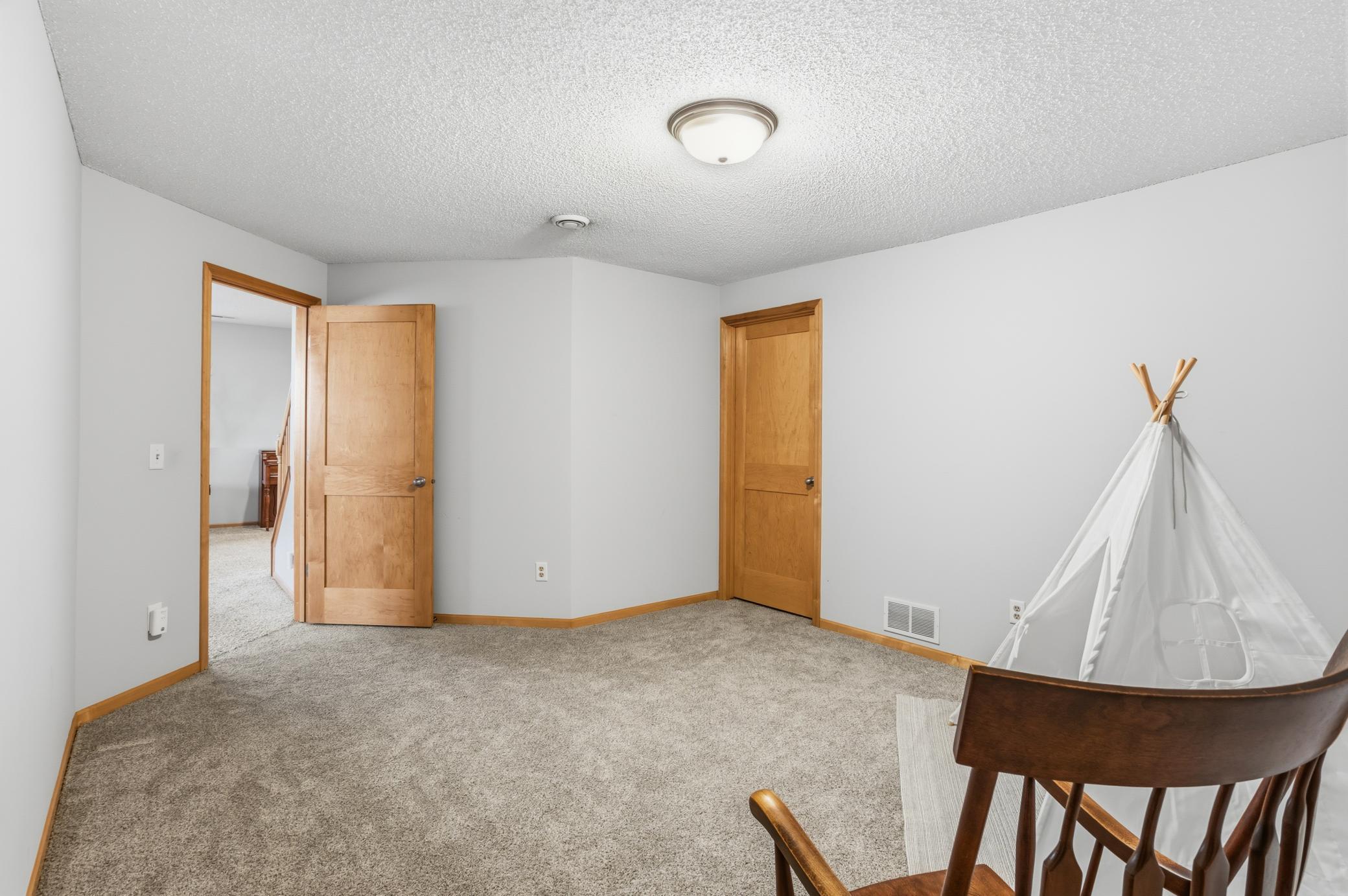 The flex room provides access to the utility room where you will find nearly everything has been recently updated!