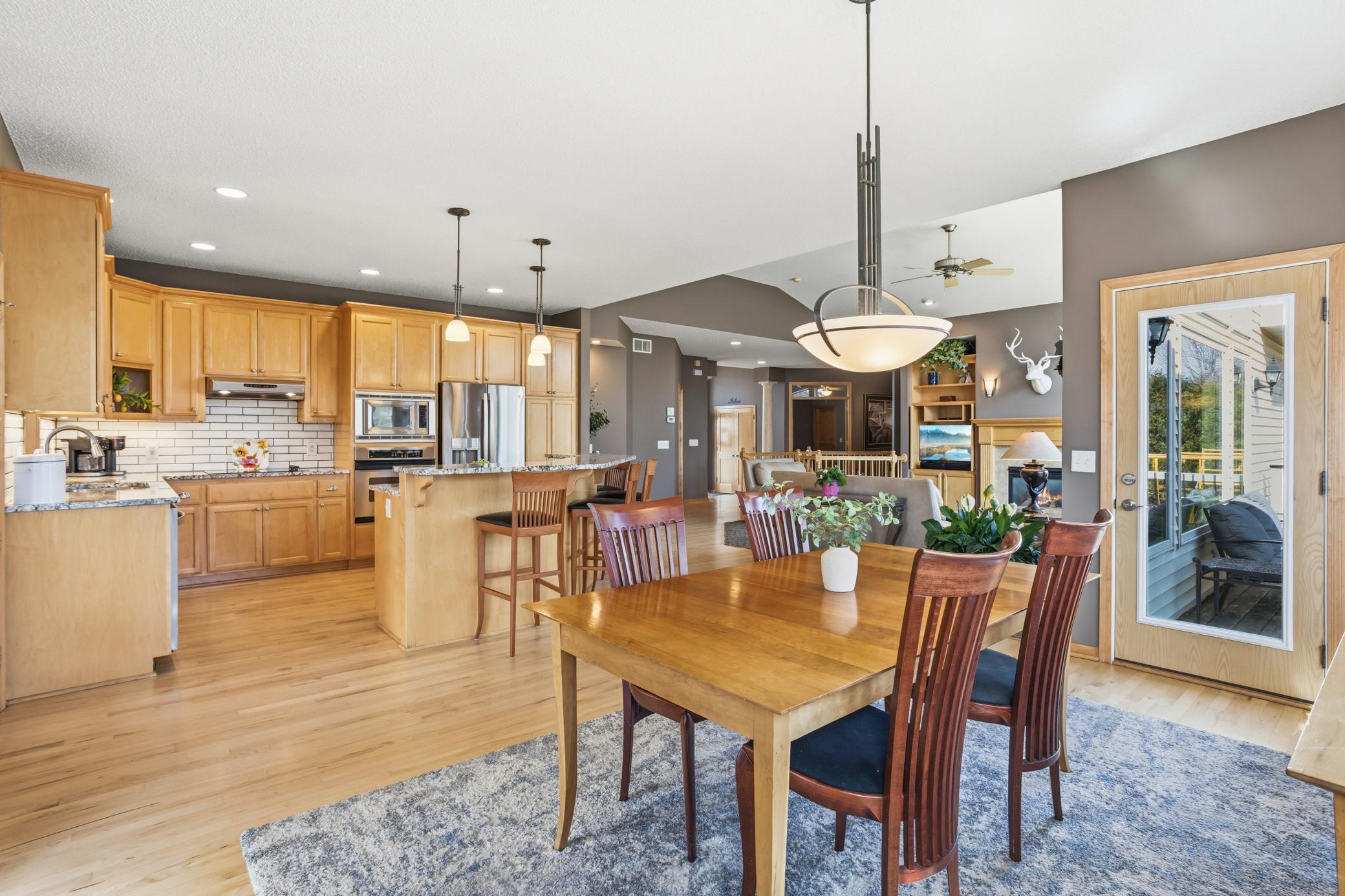 Multiple choices for dining in this home. The center island with seating offers the perfect place for casual meals or conversation while cooking, and the open layout connects effortlessly to the dining room for a more formal meal..