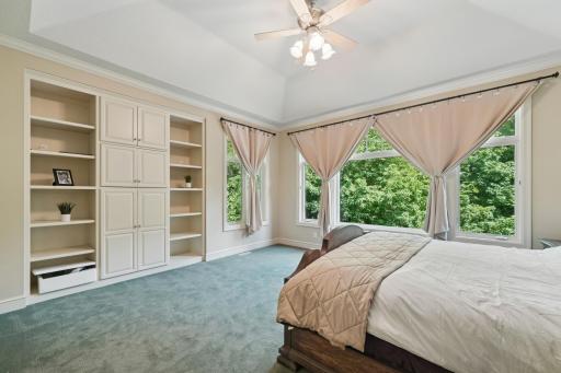The main-level vaulted ownerâs suite offers a true escape with a two-sided fireplace, jetted tub, heated floors, and dual walk-in closets.