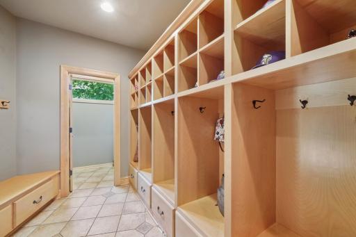 Mudroom with custom built-ins and ample storage.