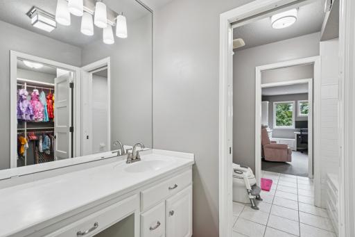 Three upper-level bedrooms, including a Jack & Jill setup and private suite.