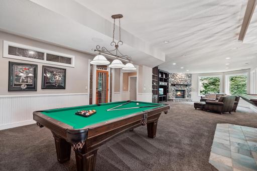 Walkout lower level with custom bar, wine cellar, and theater room.