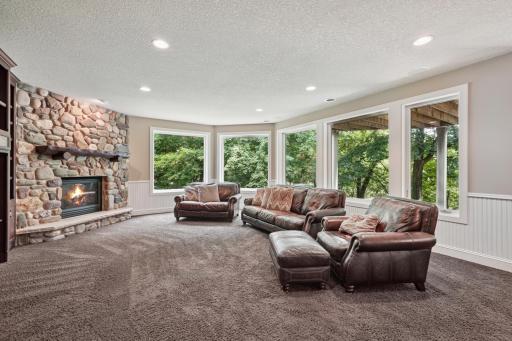 Walkout lower level with custom bar, wine cellar, and theater room.