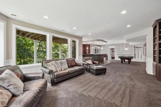 Walkout lower level with custom bar, wine cellar, and theater room.