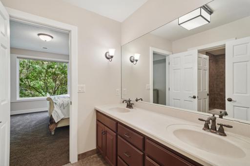 Two generous bedrooms connected by a shared Jack & Jill bathroom.