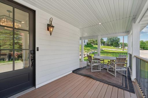 A wraparound porch that quietly becomes everyone’s favorite place.