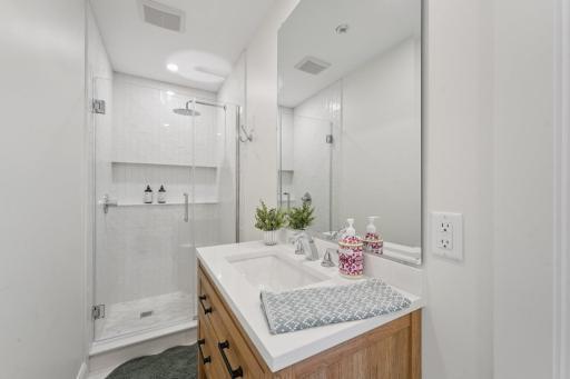 A well-appointed ensuite that completes the main-level suite.