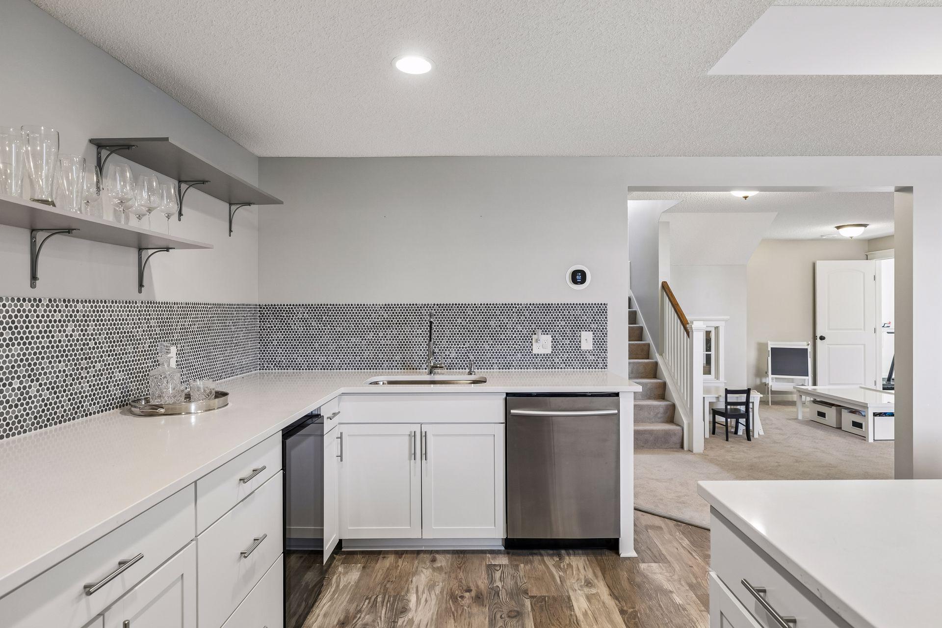 Enjoy a full fridge, beverage fridge & dishwasher
