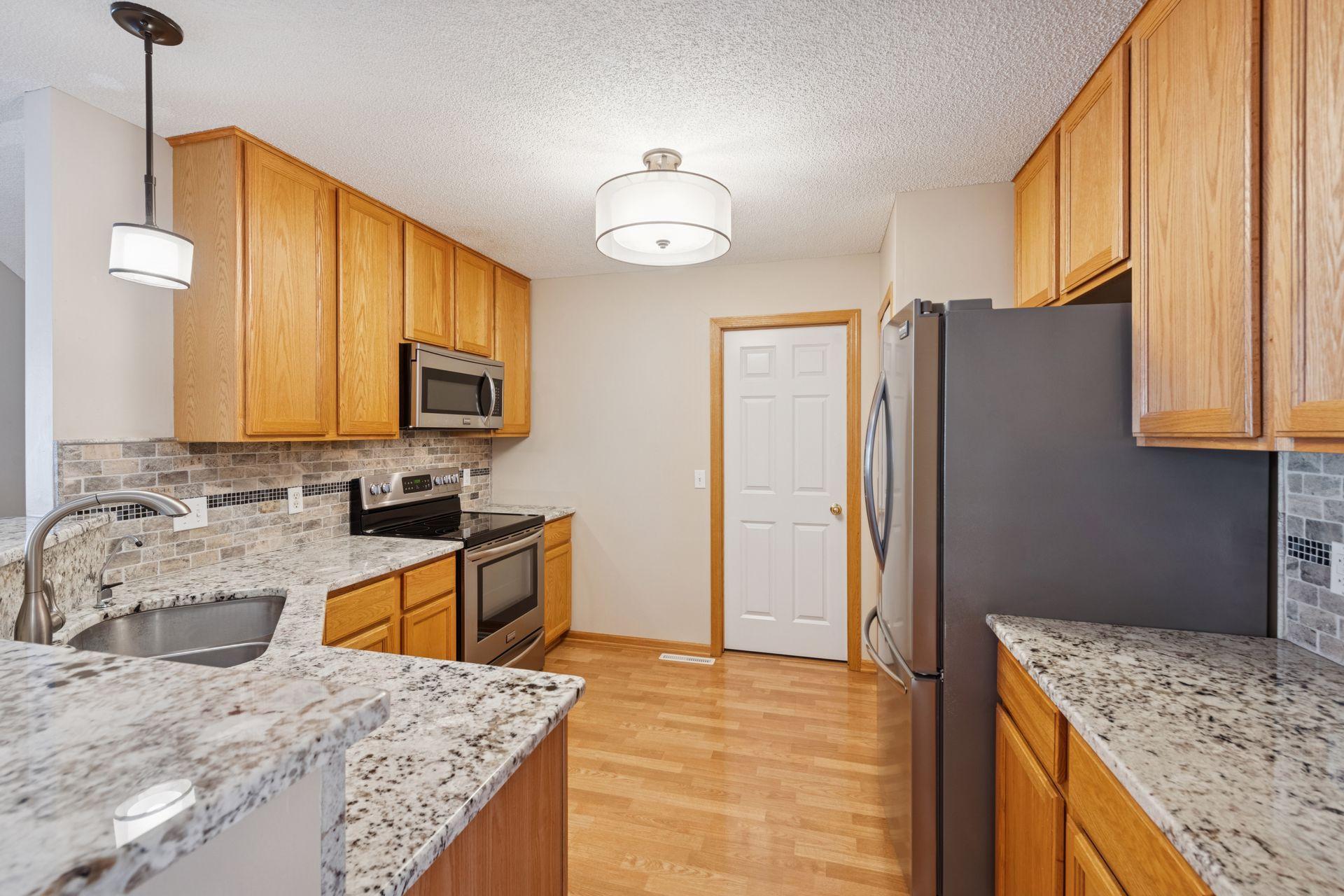 Lots of cupboard space and stainless steel appliances