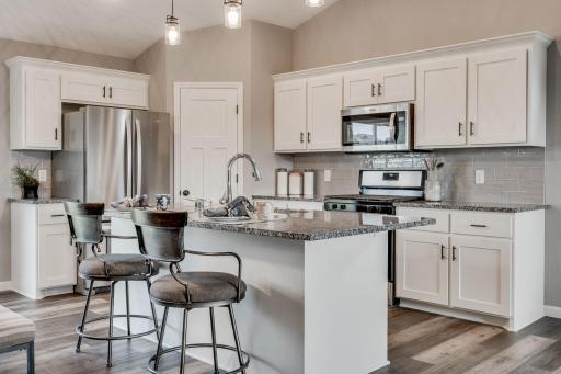 All photos are of a previously finished home of the same floor plan. Upgrades & colors will vary.