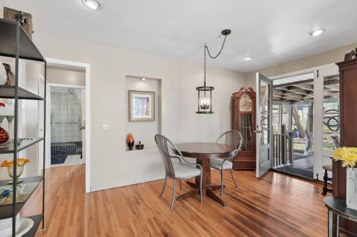 The dining area is the gathering place in the morning for inspiring conversation about the workday ahead. In the evening you converse about what you accomplished and the best part of your day. The back door leads out to an amazing screened in porch.