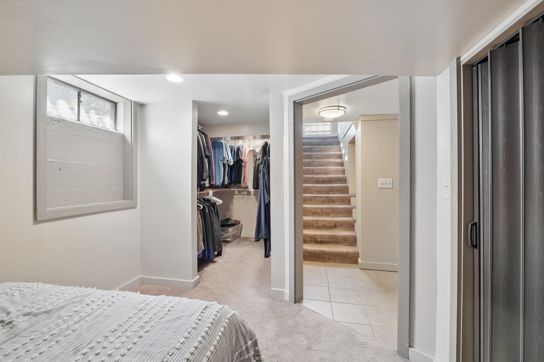 In the lower level there is a bonus room, with large closet. Can be used as an office, craft room, creative space library, or workshop. If you install an egress window it could be a 3rd bedroom.