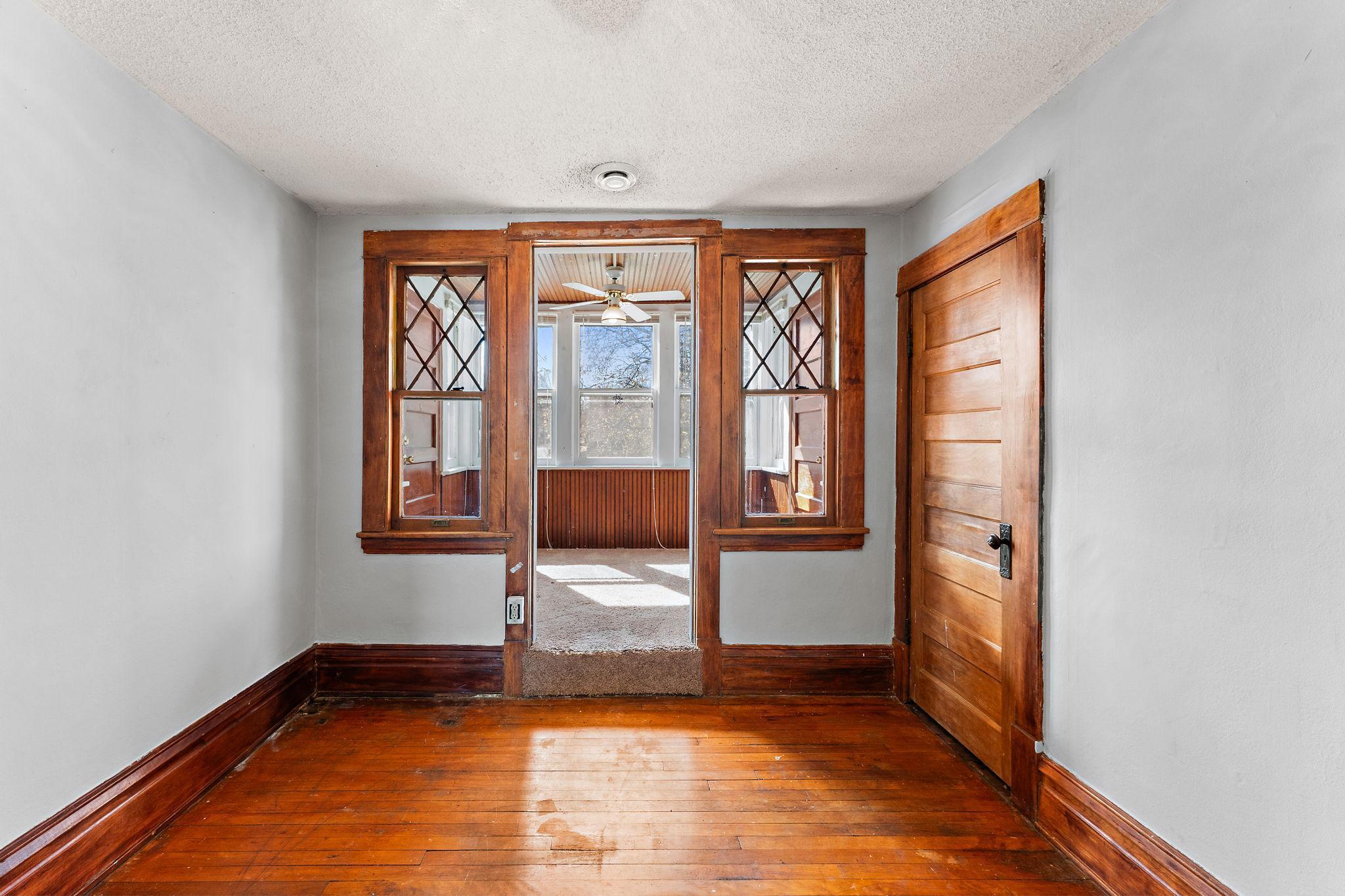 Middle Bedroom leading to the Sunroom and upper balconies
