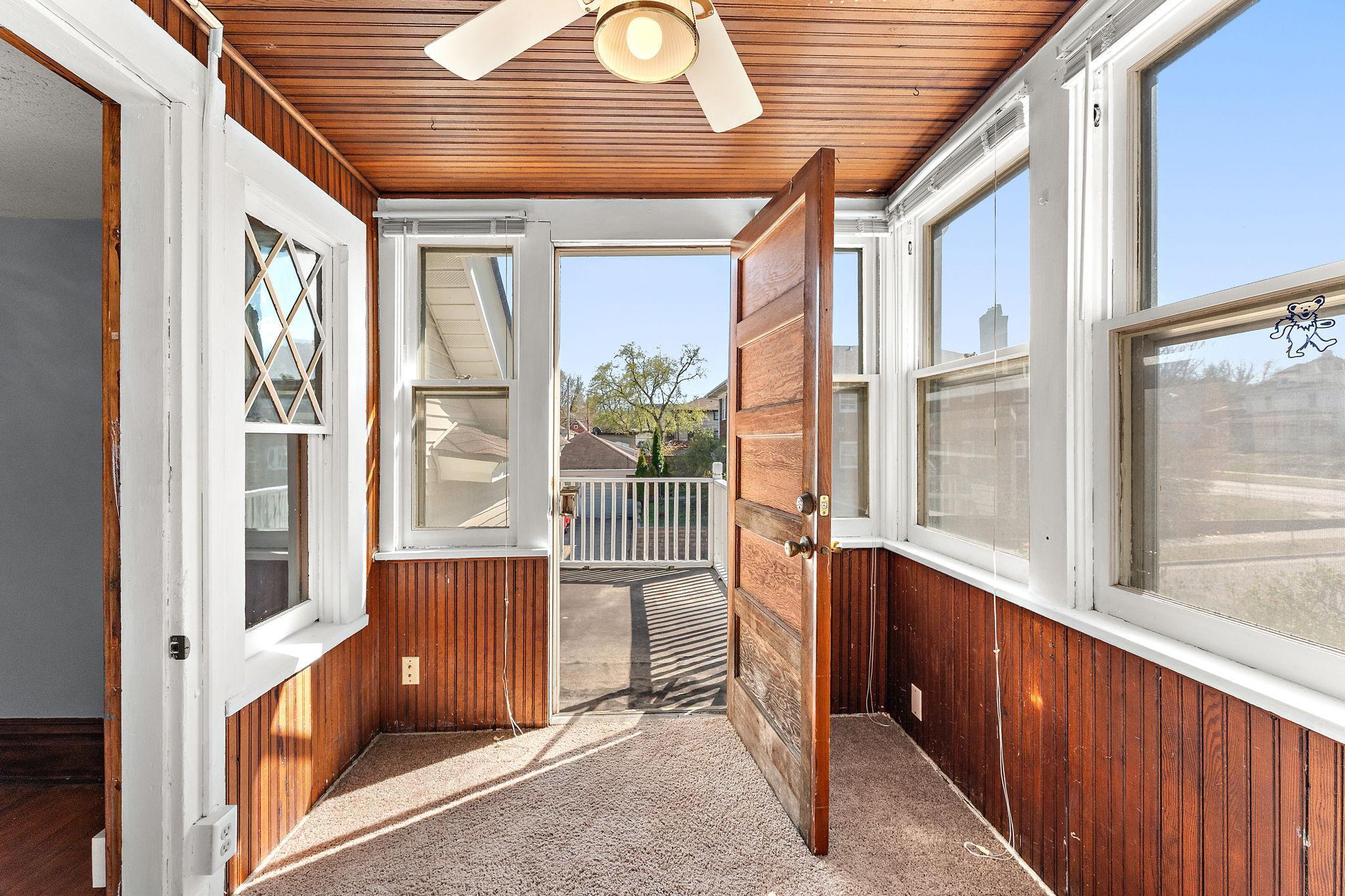 Sunroom leading to one of the upper balconies
