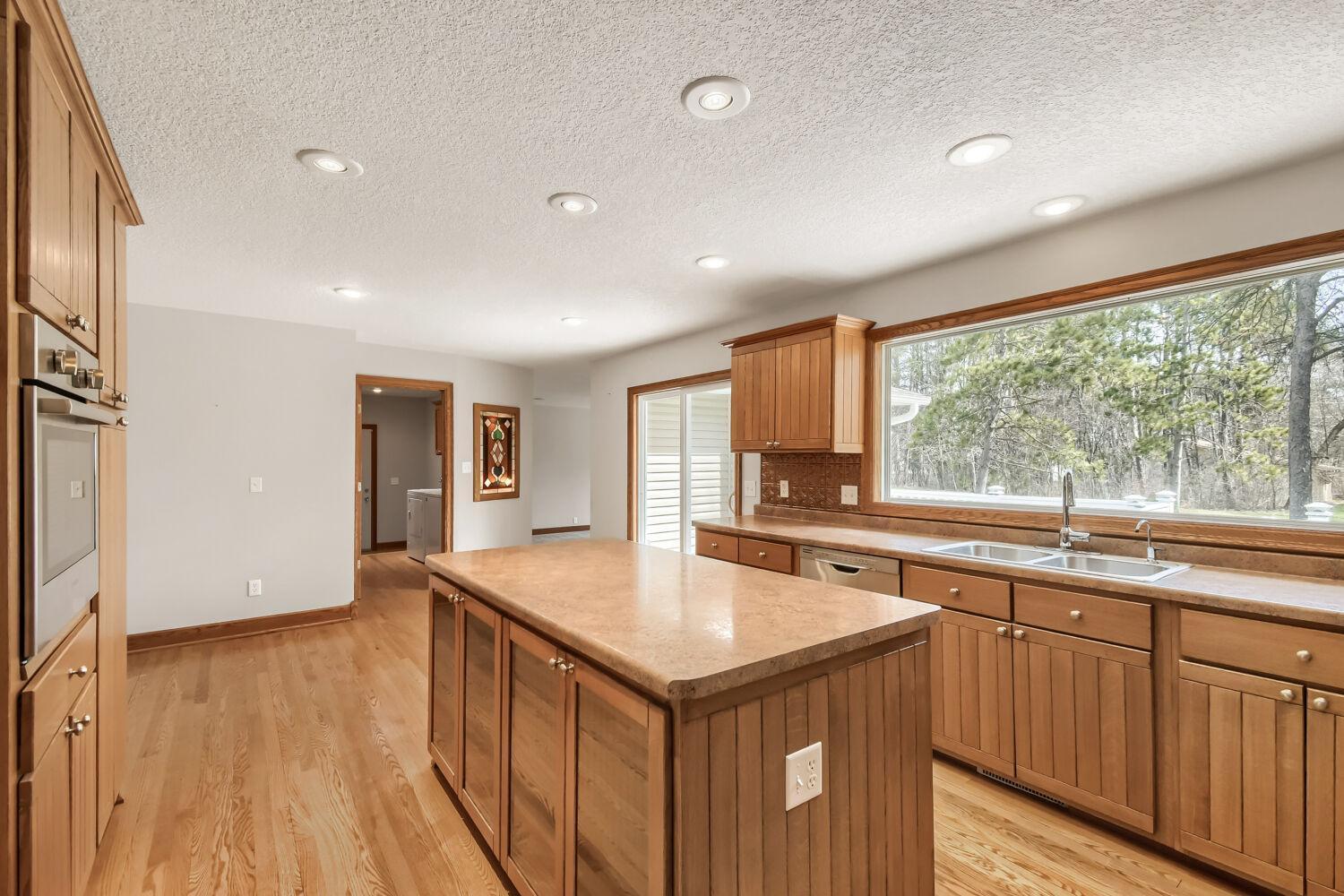 Kitchen with large island and picture window
