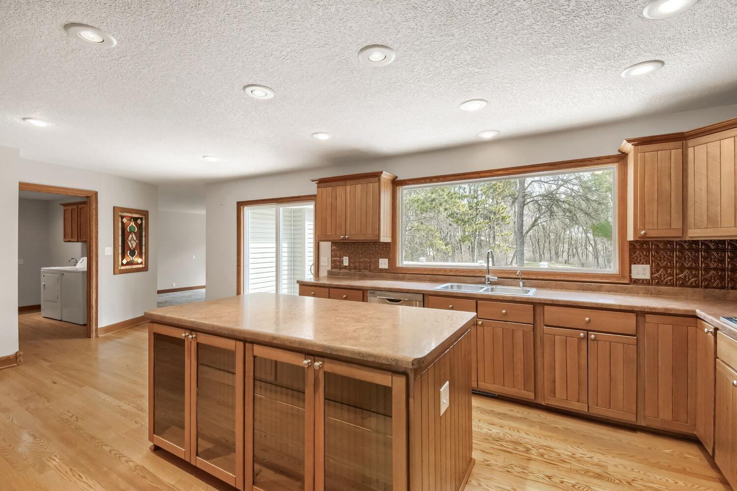 Kitchen with large island and picture window