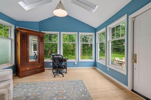 Home office with vaults, windows on 3 sides PLUS skylights.