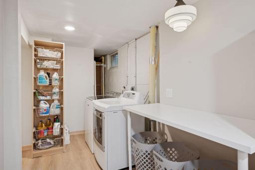 laundry room is 24 ft long with built-ins for storage