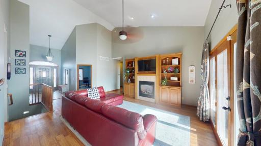 Cozy gas fireplace w/built-in entertainment center