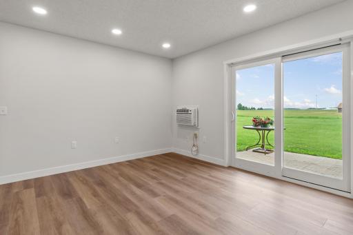 Living room with access to private backyard
