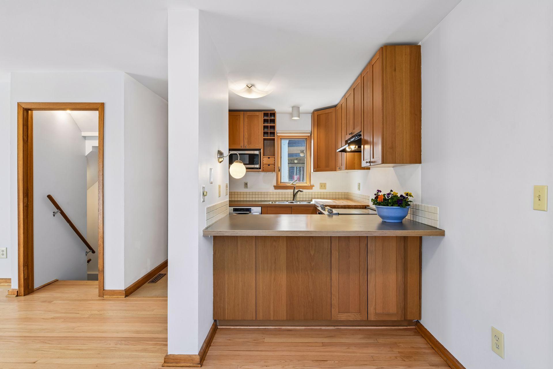 Kitchen with darling little breakfast bar