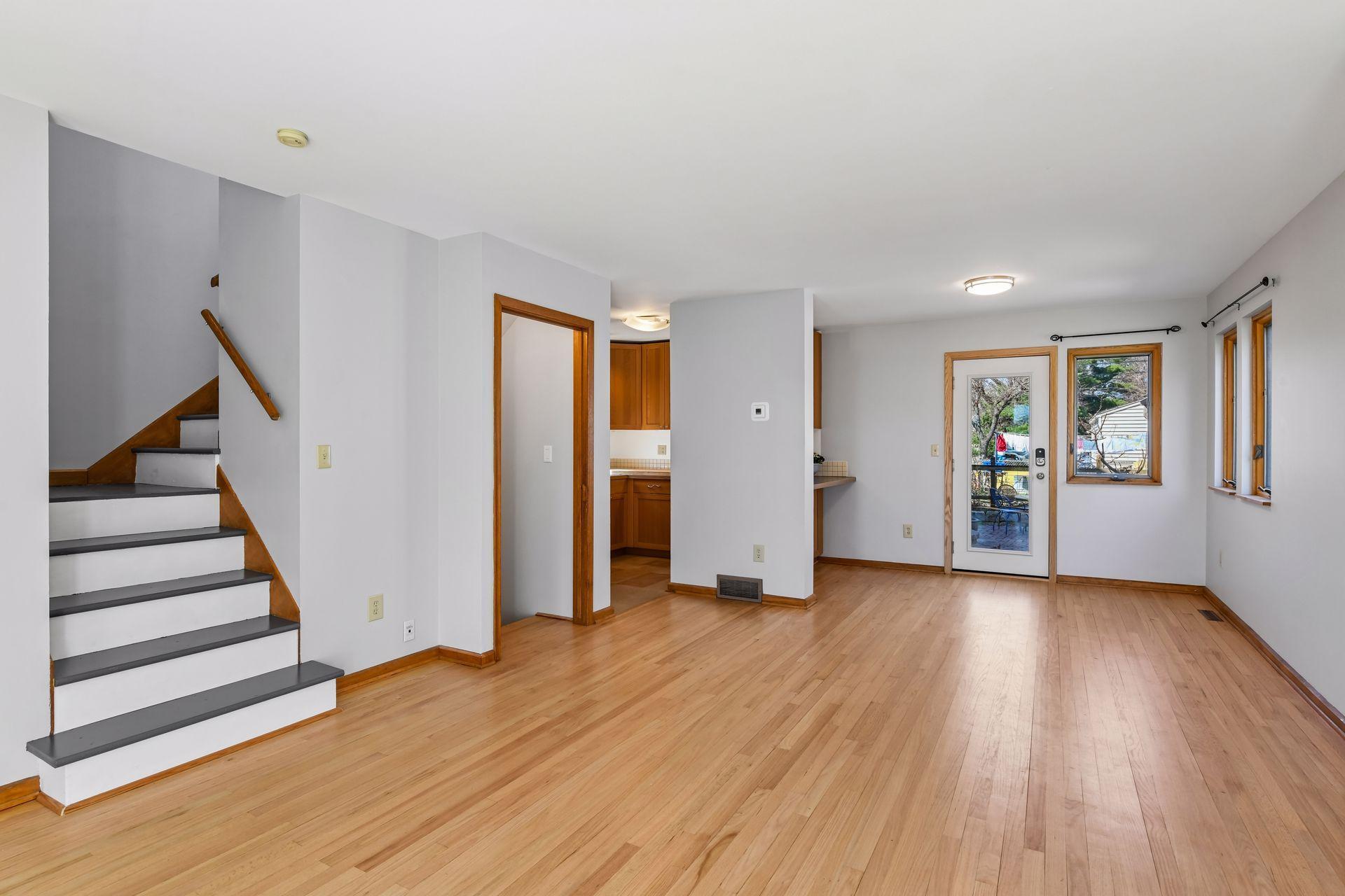 Beautifully refinished hardwood floors on main and upper level