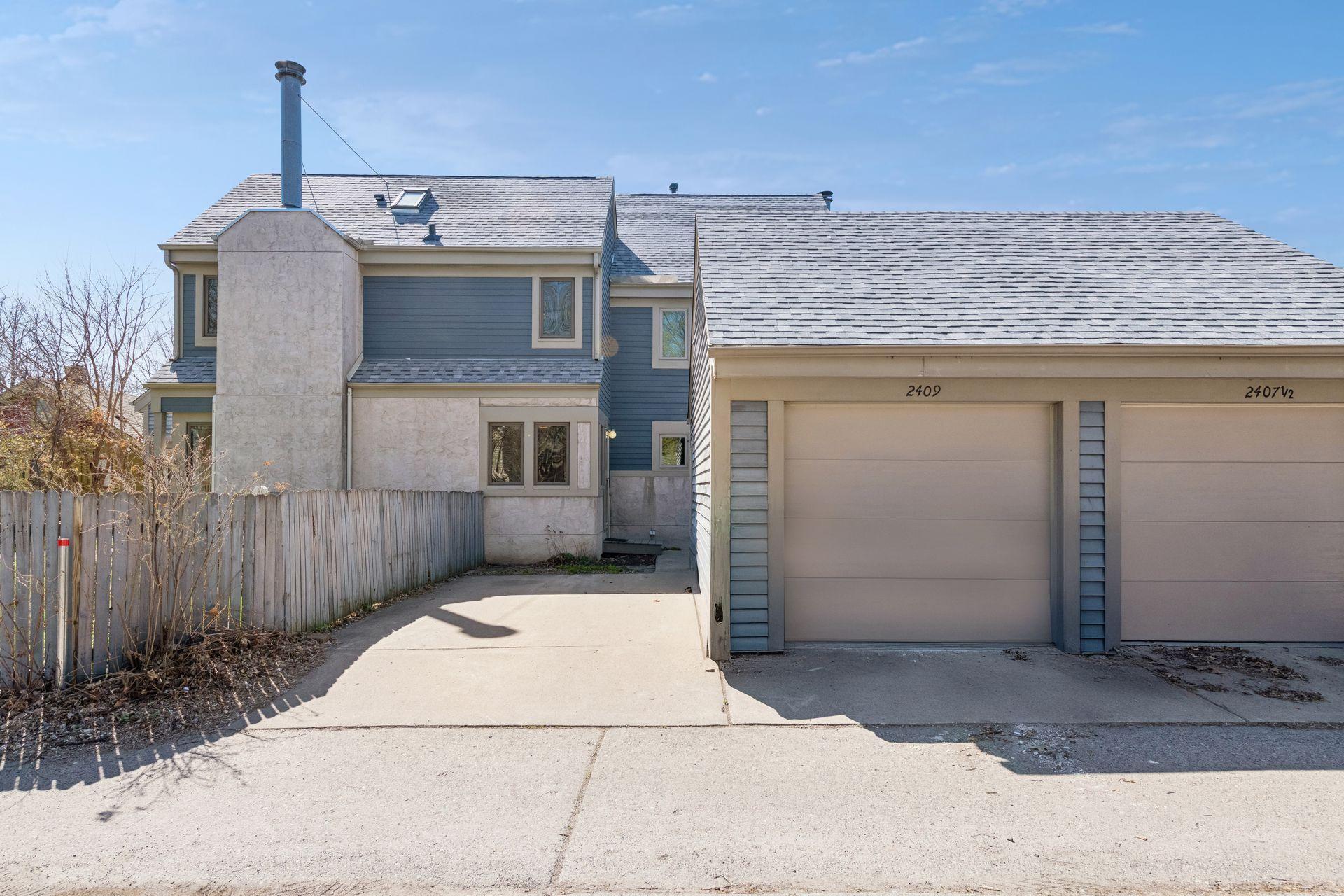 One car garage with additional guest parking - alley view