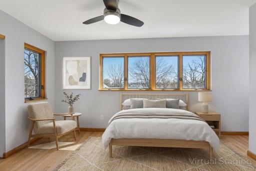Upper level bedroom 1 virtually staged as bedroom